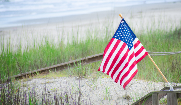 American Flag with Pawleys Island Beach in the background